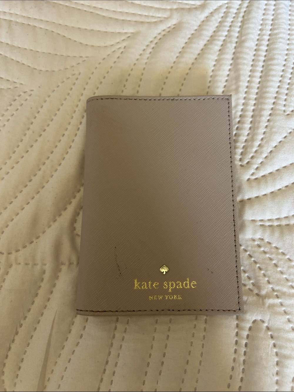kate spade Men’s Taupe Leather Passport Wallet with Gold Logo